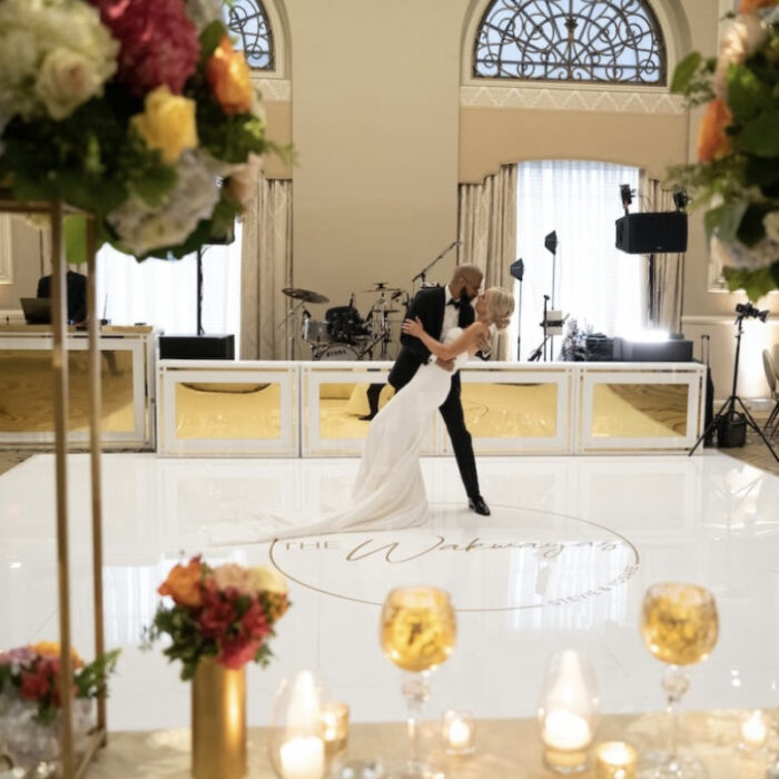 Gold Monogram on White Acrylic Floor in High Gloss with White Stage Facades with Gold Mirror