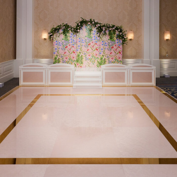 Light Pink Pearl Acrylic Floor in High Gloss with Gold Mirror Inlay and White Finestra Facades Rounded Top w/Light Pink Pearl Insert + Backdrop w/Custom Graphic Panels