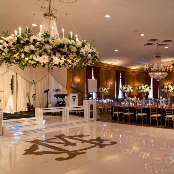 Ft Worth Club High Gloss White Acrylic Floor with Gold Monogram and FInestra Stage Facades w/Silver Mirror Insert